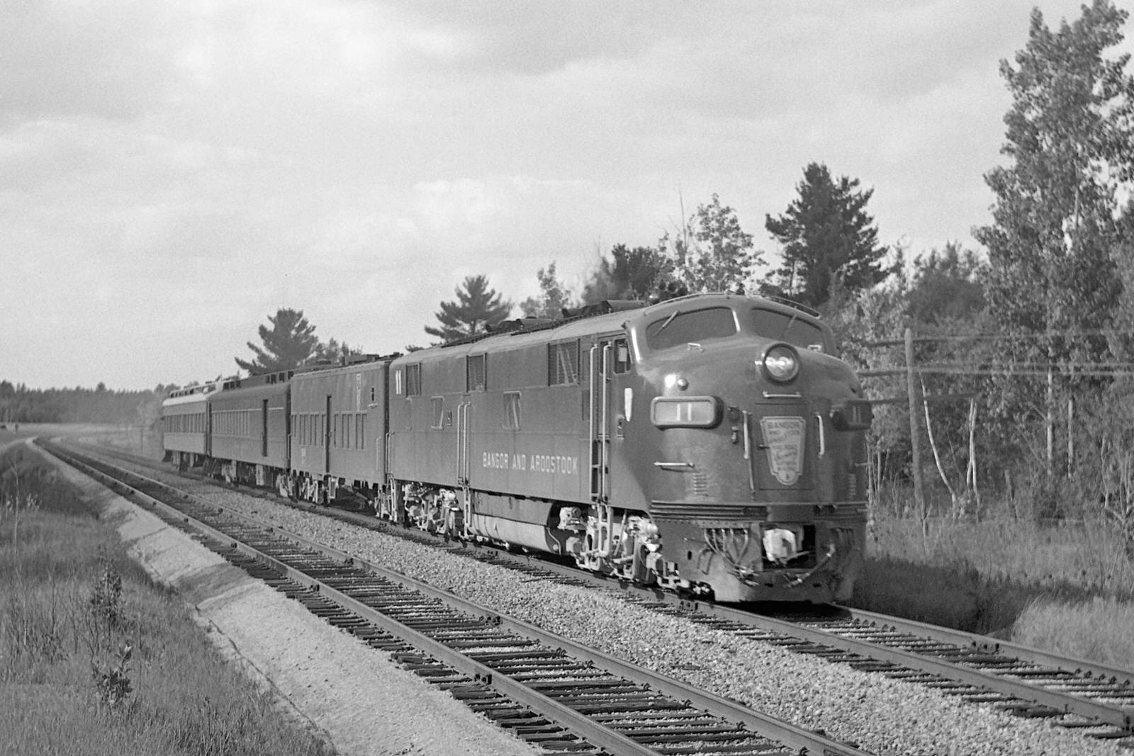 Bangor & Aroostook E7A #11 with a directors special southbound just north of Bangor, Maine on September 2, 1965.