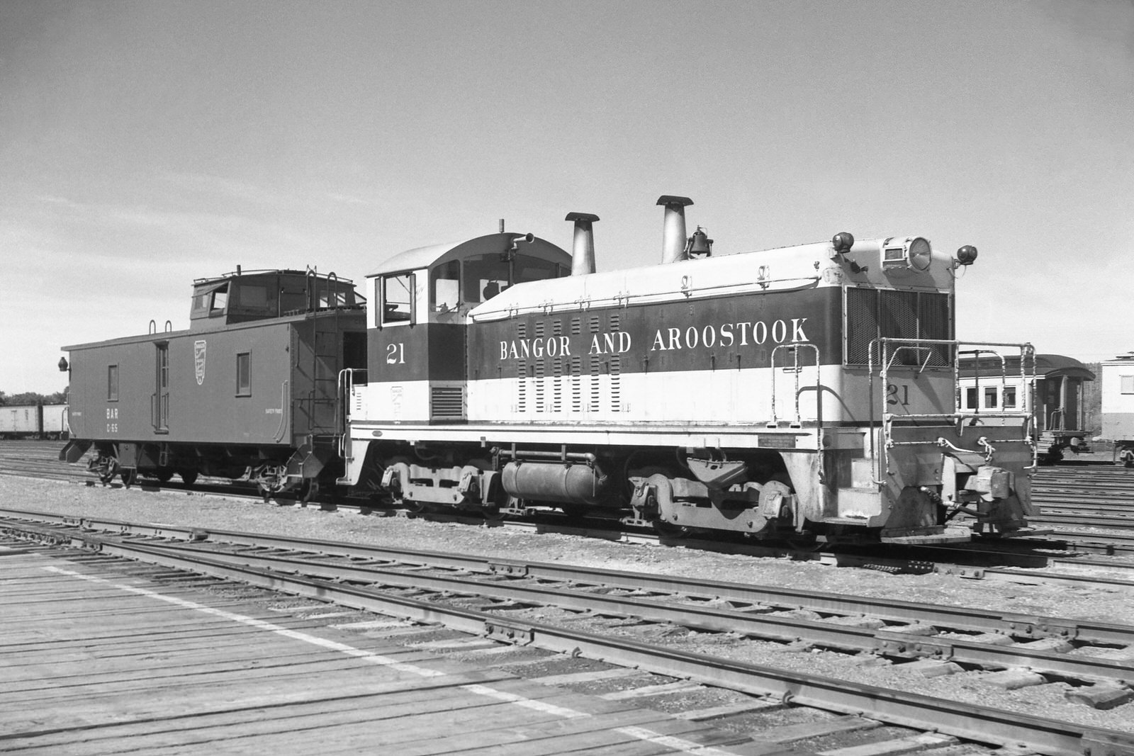 BAR NW2 #21 with caboose #C65 @ Houlton, ME on 7/3/1957