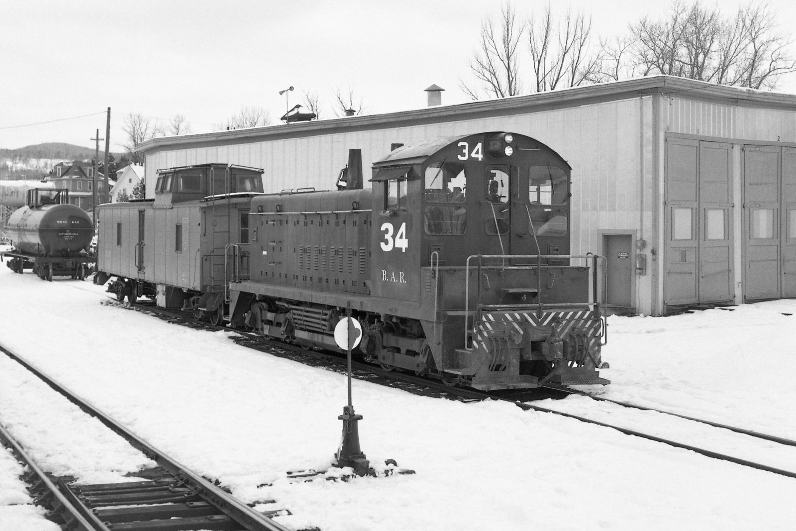 BAR SW9 #34, Ex-P&LE #8938 at Fort Kent, ME on 4/7/1973