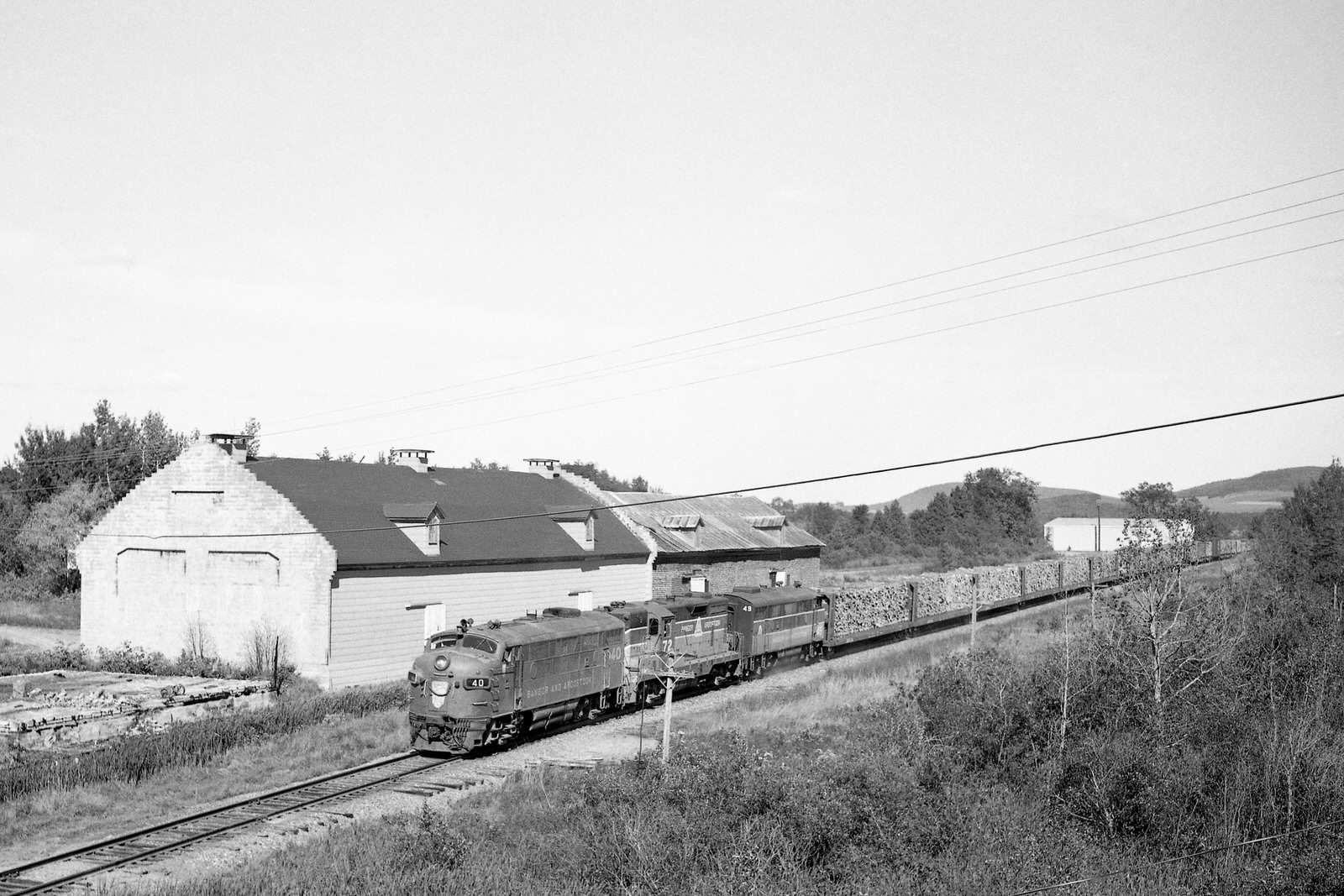 Bangor & Aroostook F3A #40, GP7 #72 & F3A #49 lead a train at Dyer Brook, Maine during the late 70's.