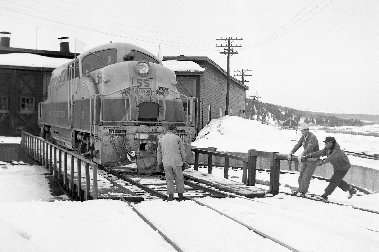 Bangor & Aroostook BL2 #55 being turned on the Armstrong Turntable at Van Buren, Maine on March 15, 1955.