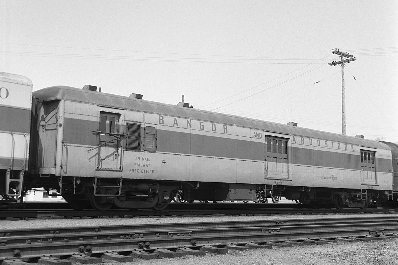 BAR Baggage / RPO #569 on the Aroostook Flyer@ Millinocket, ME on 4/22/1954. (8x12)