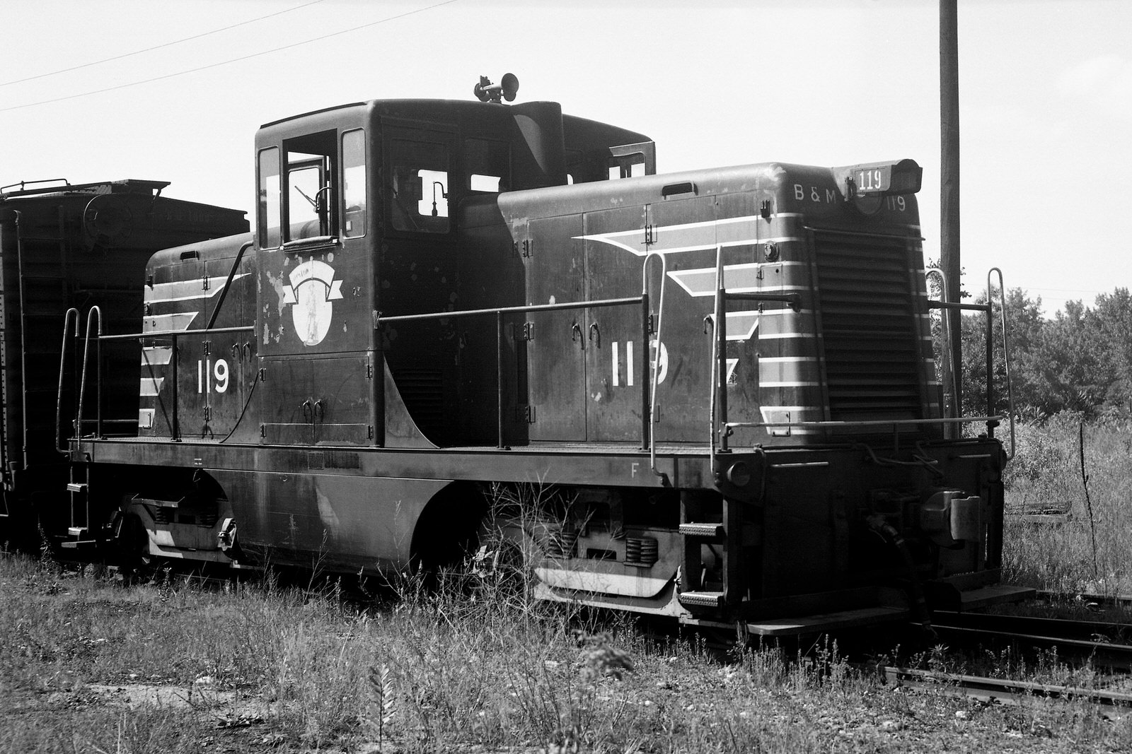 Boston & Maine 44 tonner #119 @ Bellows Falls, VT on 8/21/63. (8x12)