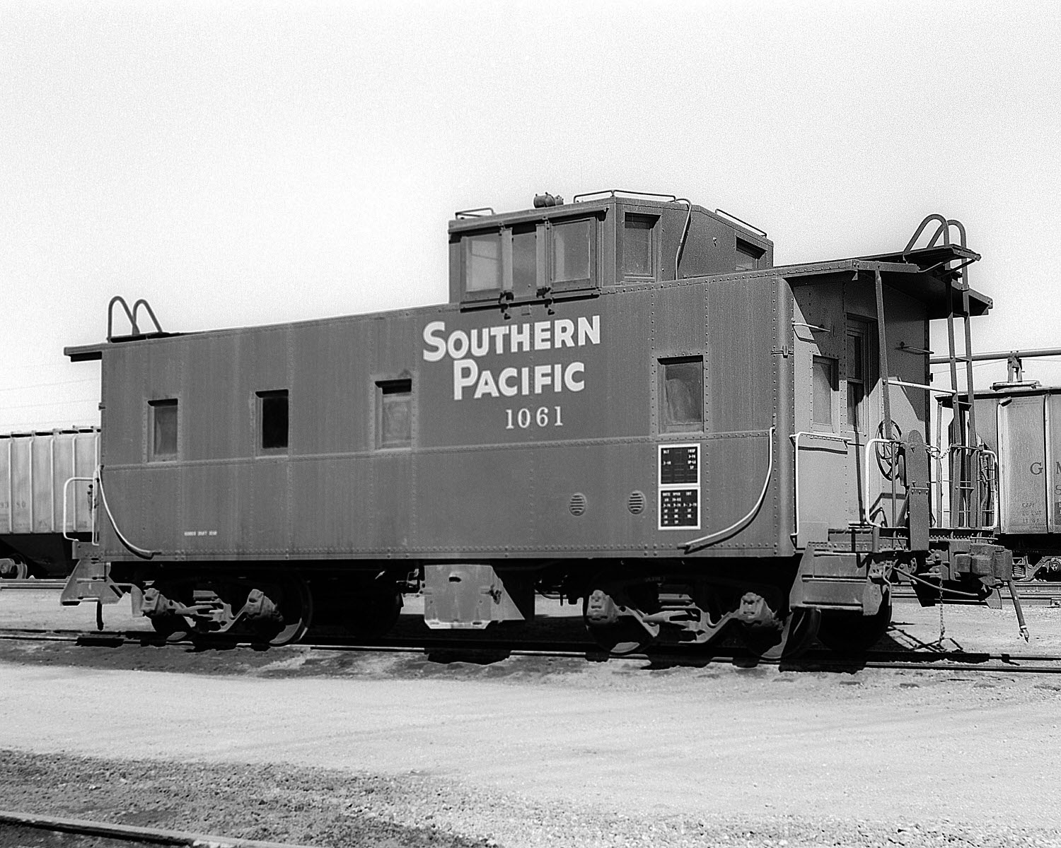 Southern Pacific Caboose #1061 at El Centro, CA on 2/18/1978. Built 3/1940. (8x10)