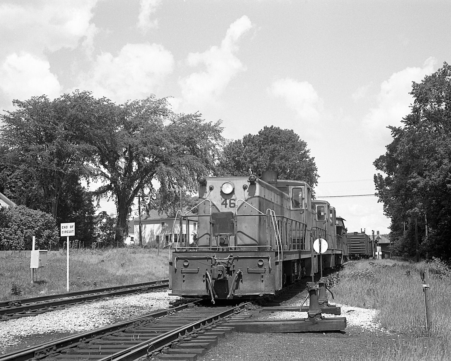 St. Johnsbury & Lamoille County Railroad 70 tonners #46, 54 & Montpelier & Barre #19 switching  at StJ&LC's yard in Swanton, VT. Mid to late 1960's. (8x10)